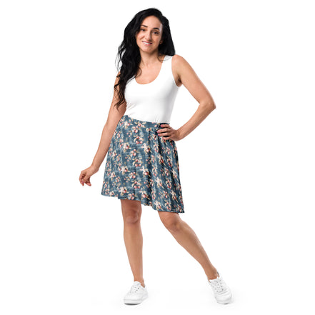 Woman wearing a white tank top and floral skirt on a white background